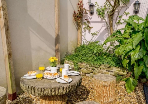 The courtyard garden at The Old Coach House, Tenby