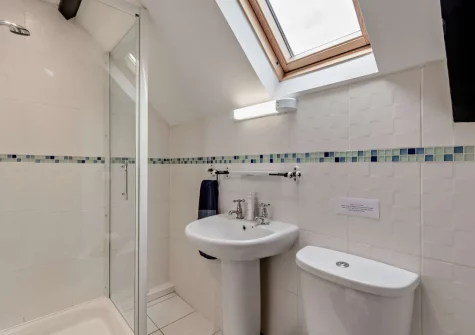 Bedroom #1 en-suite shower room at The Old School Hall, Loveston