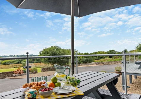 The decked terrace & alfresco dining area at The Old School Hall, Loveston