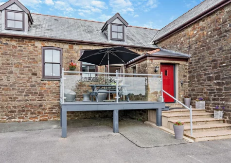 The Old School Hall is a large family holiday home in beautifully converted school hall in Loveston