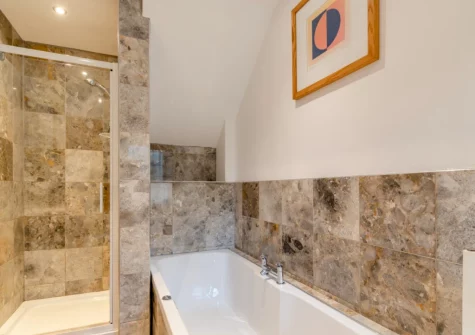 Bedroom #1 en-suite bathroom at The Old School House, Walton West