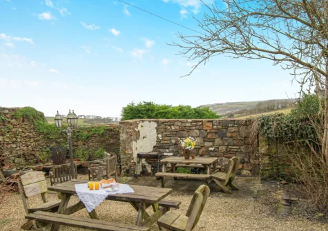 The curtyard terrace, barbecue & alfresco dining area at The Old School House, Walton West