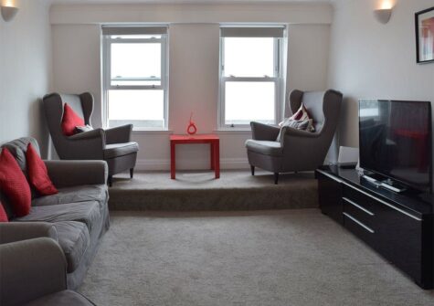 The living area at The Penthouse at Newton Croft, Tenby