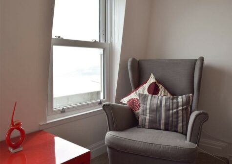 The living area at The Penthouse at Newton Croft, Tenby