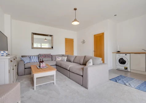 The living room & utility area at The Sandbox, Saundersfoot