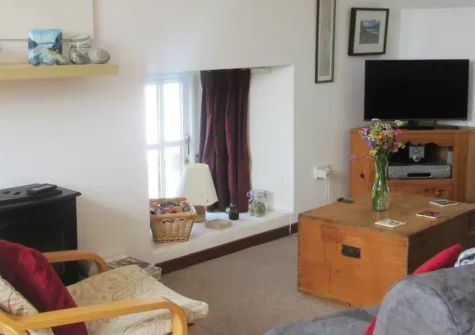 The Steps, Llandeloy is a beautifully converted granary in peaceful Pembrokeshire countryside, sleeping up to five guests across two bedrooms, with an upside-down layout capturing lovely village views and easy access to Newgale's magnificent beach.