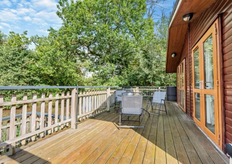 The wrap-around decked terrace & outdoor sitting area at The Sycamores, Narberth