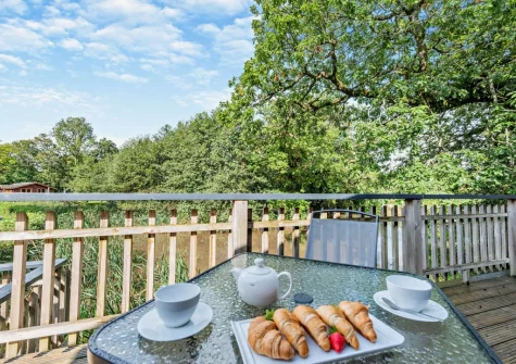 The wrap-around decked terrace & outdoor sitting area at The Sycamores, Narberth