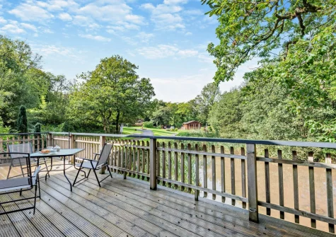The wrap-around decked terrace & outdoor sitting area at The Sycamores, Narberth