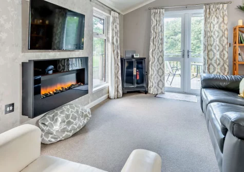 The Sycamores, Narberth is a beautifully appointed two-bedroom holiday lodge in the heart of Pembrokeshire. Enjoy chic interiors, a private wrap-around terrace, and superb access to glorious beaches, family attractions, and charming local towns.
