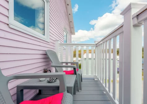 Bedroom #1 balcony & outdoor sitting area at Tickled Pink at 14 Freshwater Bay, Freshwater East