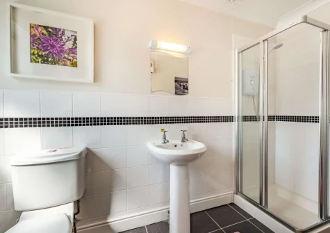 The shower room at Tickled Pink at 14 Freshwater Bay, Freshwater East
