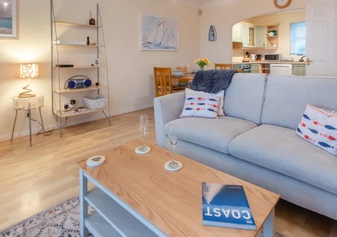 Tide View, Broad Haven is a spacious three-storey family home with sea glimpses from the balcony, an enclosed garden with lawn, and direct access to Pembrokeshire's spectacular beaches, coastal paths, and the charming city of St Davids.