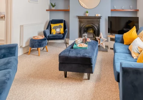 Tideway, Tenby is a stylish two-bedroom cottage just half a kilometre from golden sandy beaches, featuring contemporary interiors with a Victorian fireplace, enclosed gardens, and the medieval charm of Tenby town centre on your doorstep.