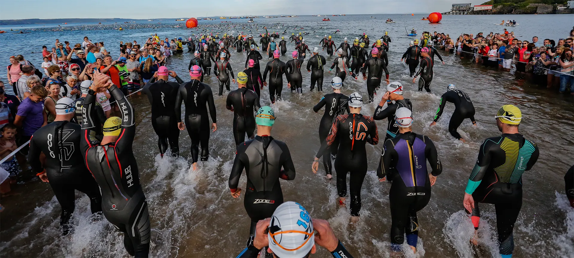 To kick-off the Long Course Weekend on Friday evening, the Long Course athletes have The Wales Swim to complete – a 2.4 mile swim that takes place on Tenby’s North Beach. On Saturday their attention turns to The Wales Sportive, and 112 miles of undulating Welsh countryside lined with enthusiastic crowds. To finish the weekend, the athletes have the small task of completing the 26.2 miles of The Wales Marathon, which is quickly establishing itself as a fantastic event in its own right.