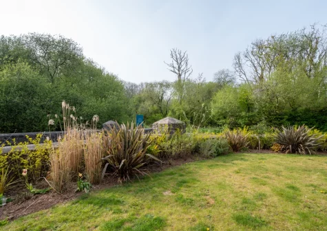 The lawned garden at Trefloyne Lodge, Penally