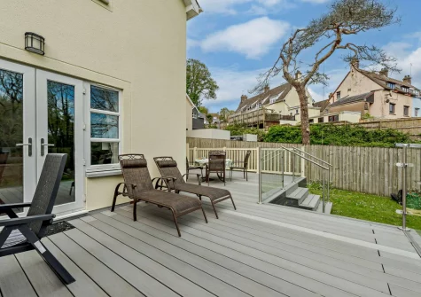The decked patio & alfresco dining area at Twmbarlwm, Tenby