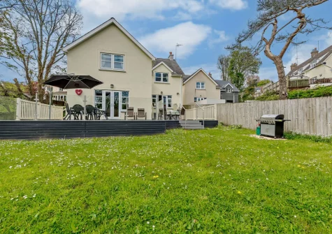 The decked patio, barbecue area & enclosed garden at Twmbarlwm, Tenby