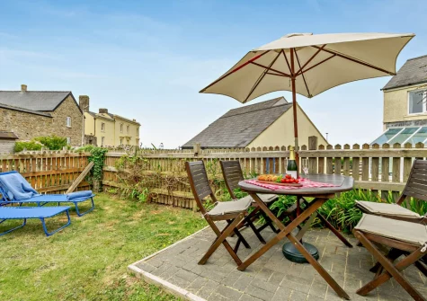 The enclosed rear garden, patio & alfresco dining area at Ty Del, Broad Haven