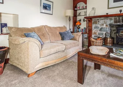 Ty Fferm, Croesgoch is a spacious three-bedroom farmhouse on a working farm near St Davids, featuring traditional Aga cooking, cosy woodburner, enclosed gardens, and the authentic experience of collecting fresh farm eggs on your countryside escape.