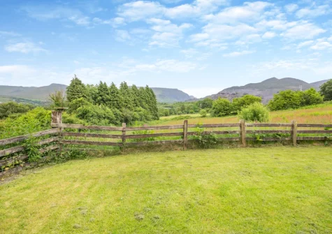 Enjoy far-reaching views of Snowdonia & beyond from the garden at Ty Gwair, St Anns Bethesda