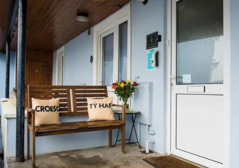The outdoor bench seating at Ty Haf, 4 Dunmore Apartments, Tenby