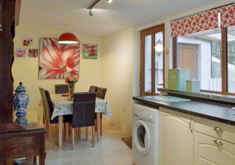 The kitchen & dining area at Ty Hapus, Dwrbach