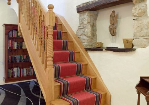 The hall & stairs to the first floor at Ty Hapus, Dwrbach
