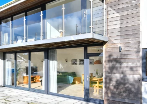The large patio with barbecue & outdoor furniture at Ty Nant, Llaniestyn