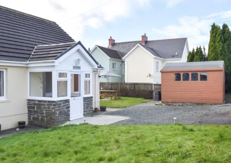 The enclosed lawned garden at Ty Twt, Clunderwen