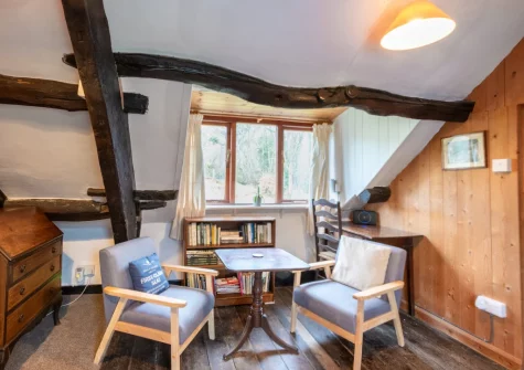 The library landing, offering a peaceful retreat, at Ty'n Lon Isaf, Bontddu