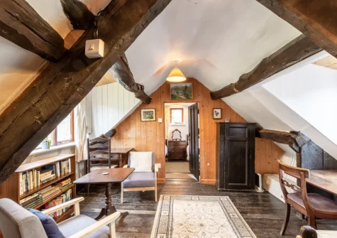 The library landing, offering a peaceful retreat, at Ty'n Lon Isaf, Bontddu