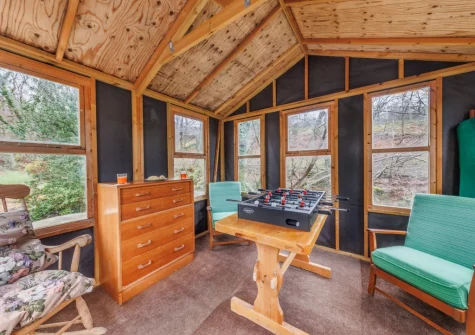 The riverside games / sun room at Ty'n Lon Isaf, Bontddu
