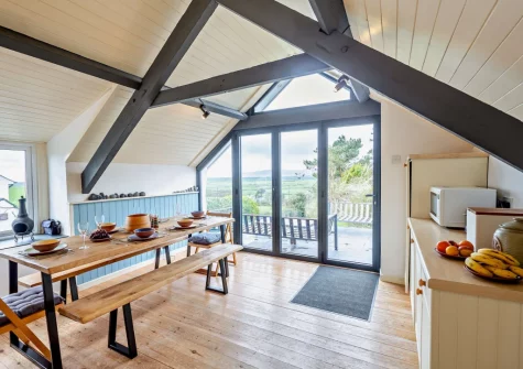 The kitchen & dining area at Ty'n Y Mur Cottage, Abersoch