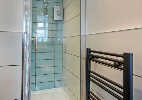 Bedroom #1 en-suite shower room at Ty'n Y Mur Cottage, Abersoch