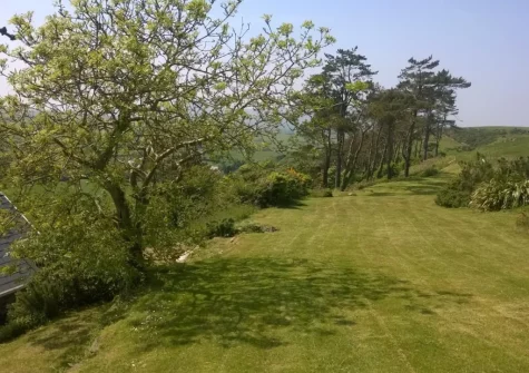 The very large enclosed rear garden at Ty'n Y Mur Cottage, Abersoch