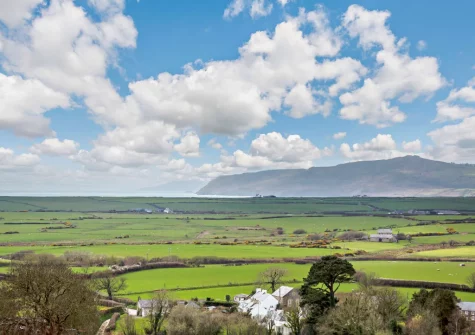 Enjoy stunning views from the rear garden & patio looking at Bardsey Island and Hell's Mouth
