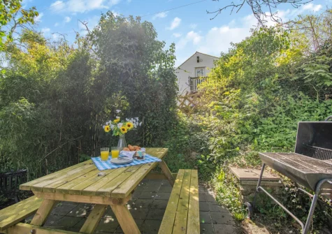 The patio, barbecue & alfresco dining area at Tyr Wennol, Fishguard