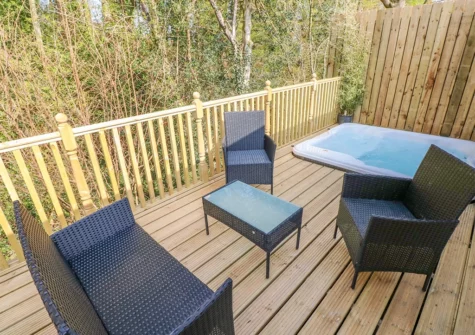 The hot tob & decked balcony at Valley Grove 8, Pentlepoir
