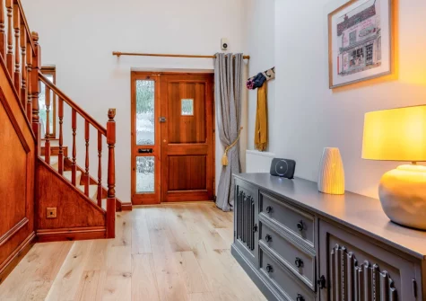 The entrance hallway & stairs up to the first floor at Valley View, Manorbier
