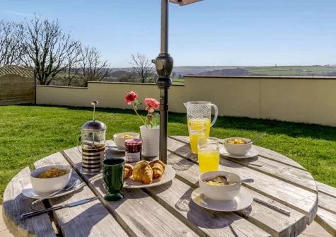 The patio, alfresco dining area & enclosed garden at Wilwin, Maenclochog