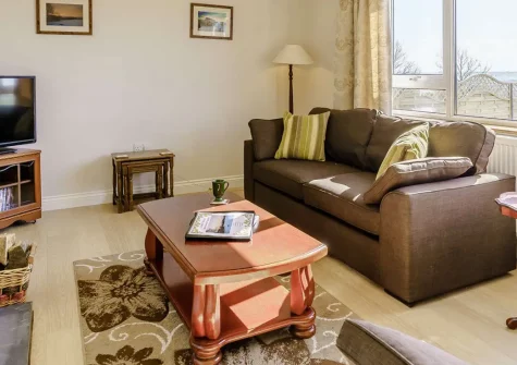 Wilwin, Maenclochog is a spacious countryside retreat on the edge of the Preseli Hills, featuring a private hot tub, games room, and far-reaching rural views. Perfect for families seeking countryside charm and memorable Welsh holidays.