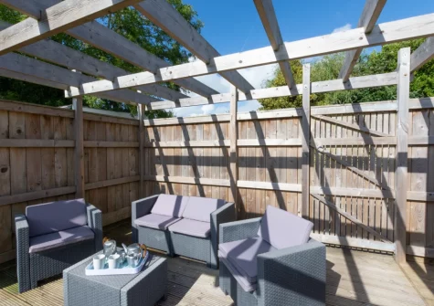 The raised decked patio & outdoor sitting area at Woodbine Cottage, Saundersfoot