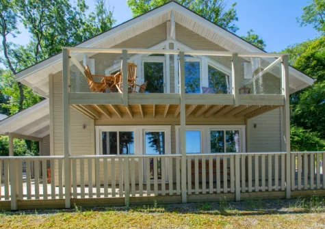 The decked enclosed veranda & patio with alfresco dining area at Woodland View, Trefloyne Manor, Penally