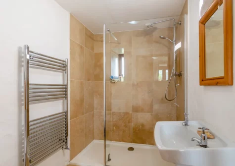 Bedroom #1 en-suite shower room at Workshop Cottage, Trefasser