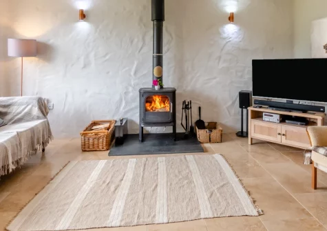 Workshop Cottage, Trefasser is a characterful three-bedroom barn conversion on a peaceful Pembrokeshire smallholding, featuring cosy wood burner living, handmade kitchen, acres of meadows to explore, and coastal trails from your door.