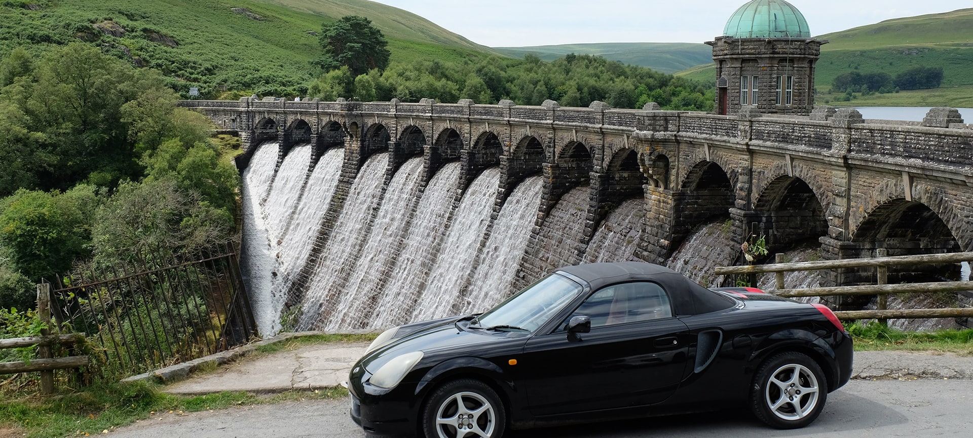 Craig Goch is the highest upstream of the series of dams in the Elan Valley - located at a height of 1,040 feet (317 metres) above sea level. Craig Goch is seen by many as the most attractive of the dams, with an elegantly curved retaining wall and a series of arches carrying a narrow roadway across the top of the dam. It has a domed valve tower and the structure is typical of the 'Birmingham Baroque' style of much of the waterworks scheme.