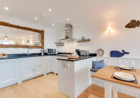The kitchen & dining area at Wren Cottage, Saundersfoot