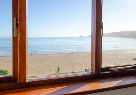 The beach & sea view from bedroom #1 at Wren Cottage, Saundersfoot