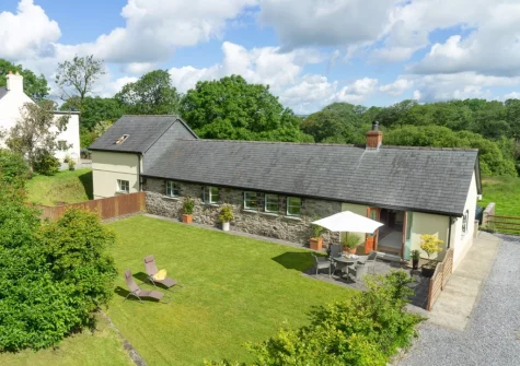 The patio, alfresco dining area & front garden at Y Beudy, Clynderwen